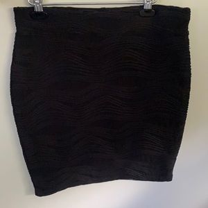 JLO black textured skirt.